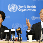 World Health Organization (WHO) Director-General Margaret Chan (L) sits next to Keiji Fukuda, WHO's assistant director general for health security, as he addresses the media after a two-day meeting of its emergency committee on Ebola, in Geneva August 8, 2014. West Africa's raging epidemic of Ebola virus is an "extraordinary event" and now constitutes an international health risk, the WHO said on Friday.   REUTERS/Pierre Albouy (SWITZERLAND - Tags: HEALTH POLITICS) - RTR41NU0